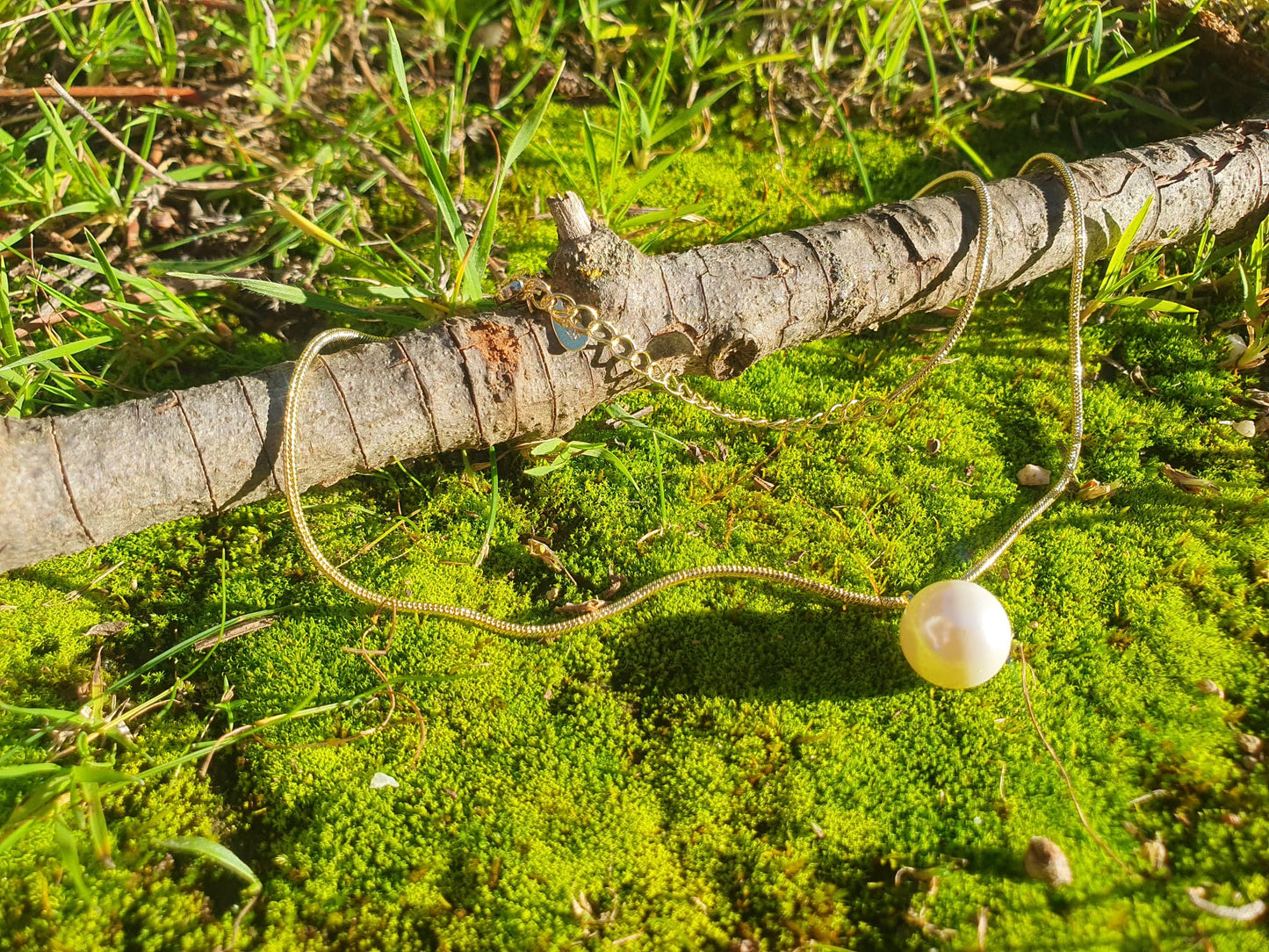 Collar elegante con perla