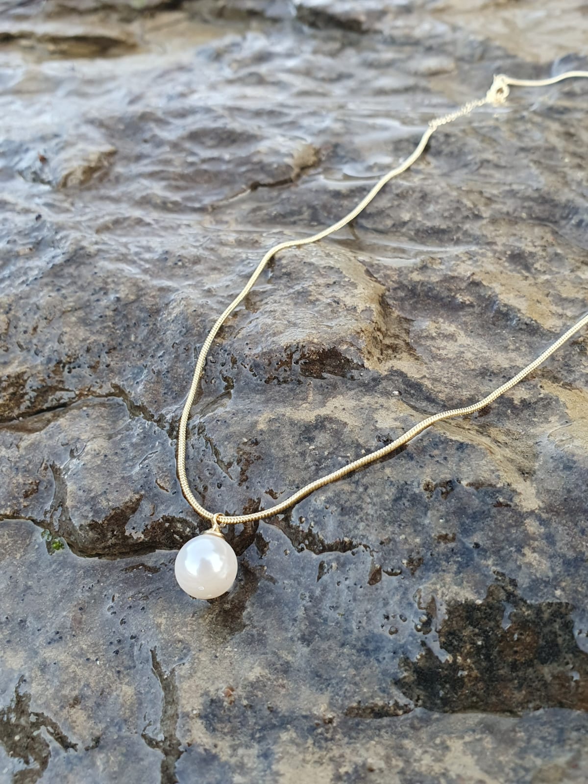 Collar elegante con perla