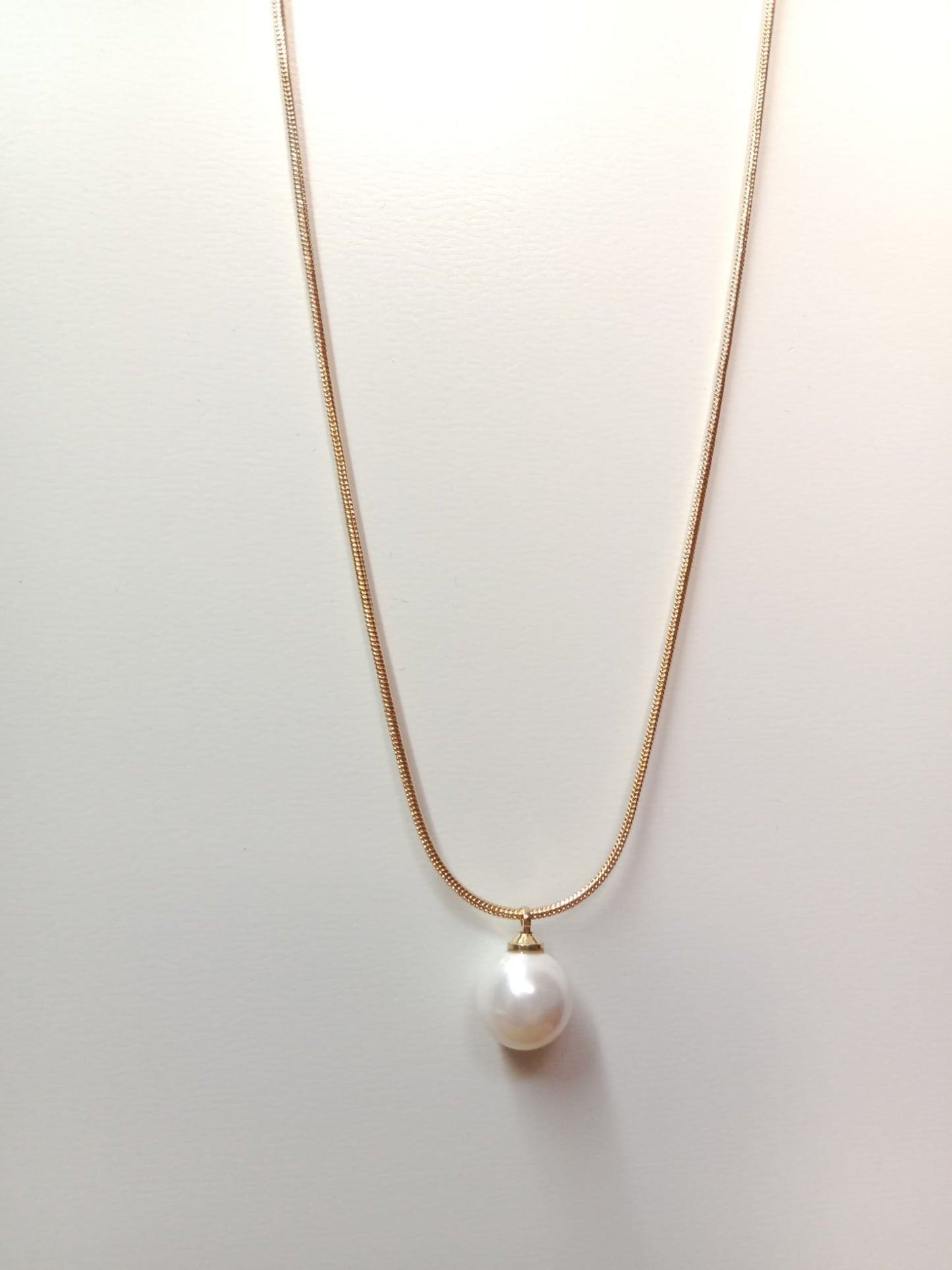 Collar elegante con perla